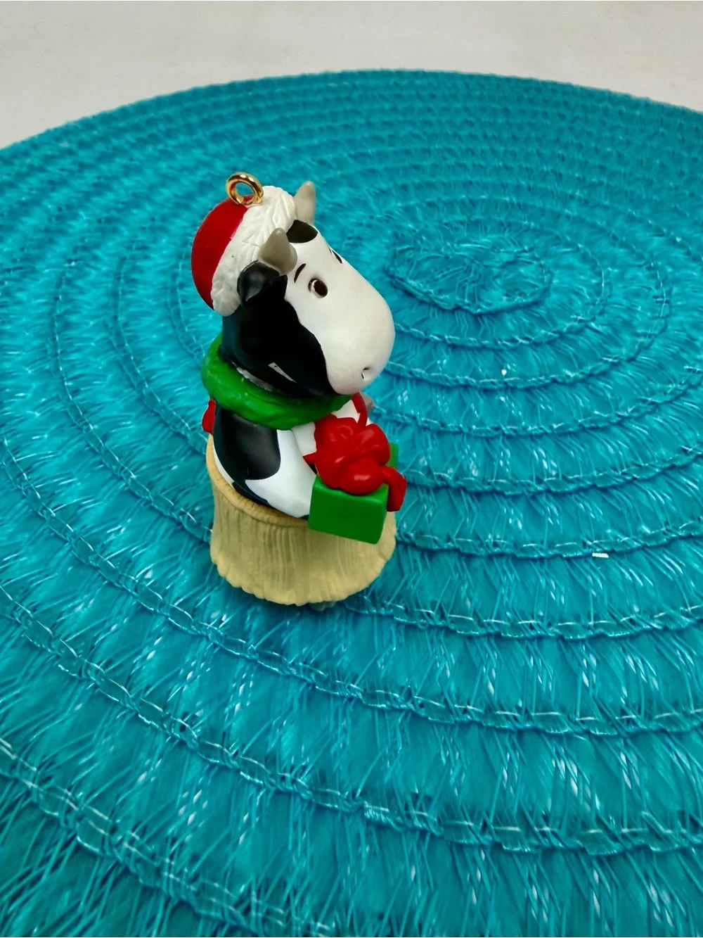 Hallmark White and Black Cow Ornament with Red and Green Gift